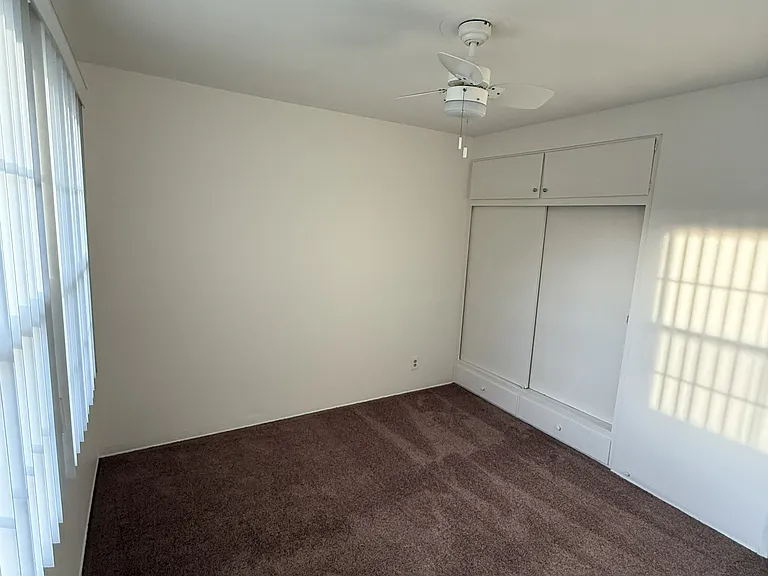 Bedroom with new carpet