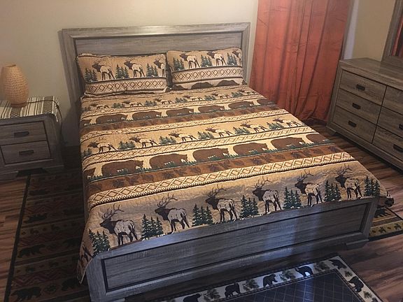 Master bedroom, king sized bed.