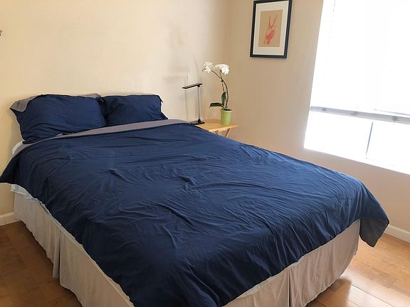 Second bedroom fits a queen bed comfortably, end tables and desk. Lots of closet space.