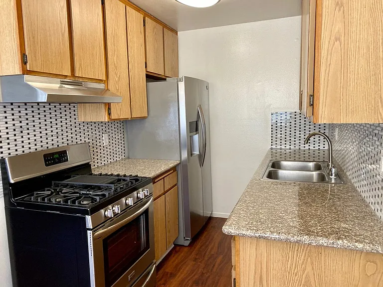 Woodman Place Apartments — Photo 26