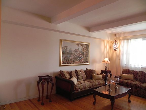 Large, light-filled living room.