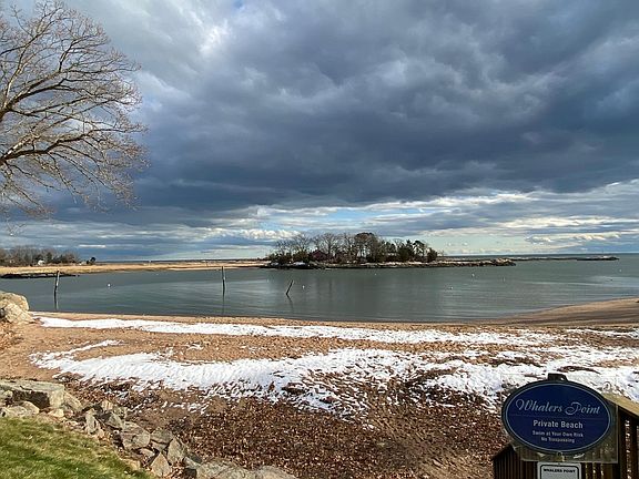 Stairs to beach. View of Long Island sound, Kelsey island and Farm river.