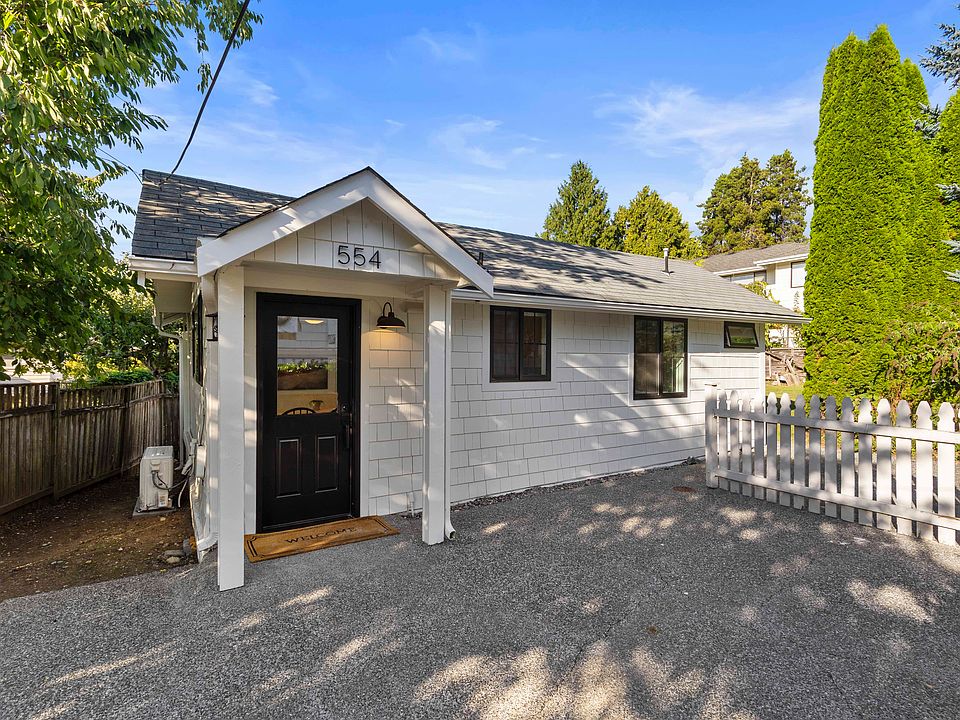 Front door and parking spaces.