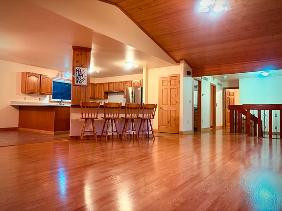 upstairs living room, dining room, and kitchen are open