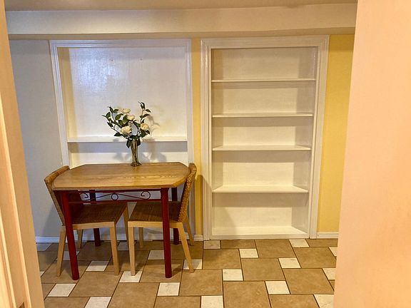 Built in shelves, cozy eating area.