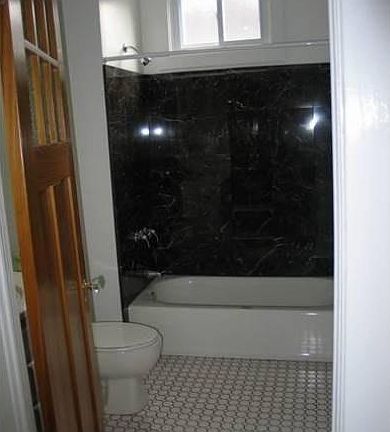 main bath w/ marble tub
