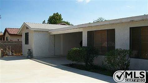 Back patio. Very large concrete area.