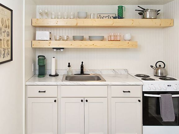 2nd image of 10 1/2 Robin St NW #1