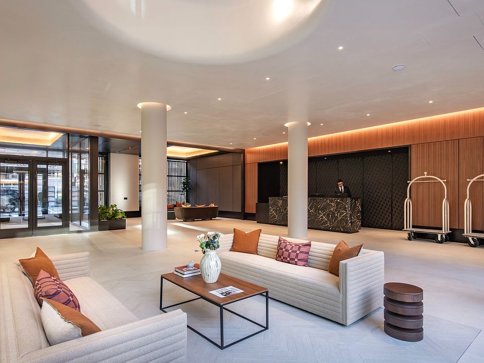 Welcome to Mabel, where modern design meets comfort. Our inviting lobby features stylish furnishings and warm lighting, creating the perfect environment for relaxation and connection. Explore what Mabel has to offer today! Schedule a visit now.