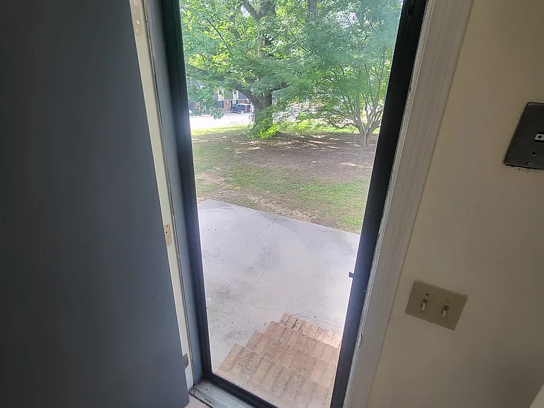 Door leading outside to the patio