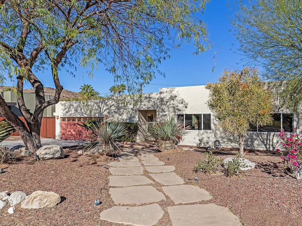 Lovely home on one block street in quiet area with large 2 car garage.