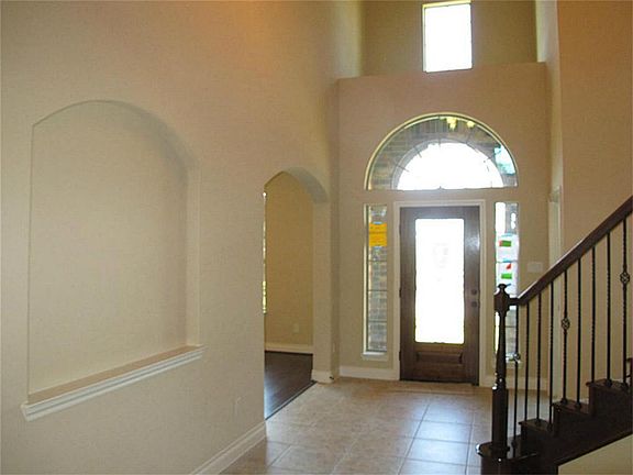 Another view of impressive 2 story foyer
