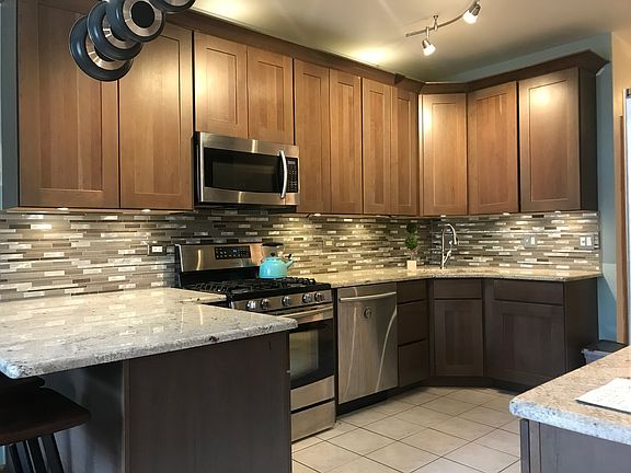 cherry cabinets and granite