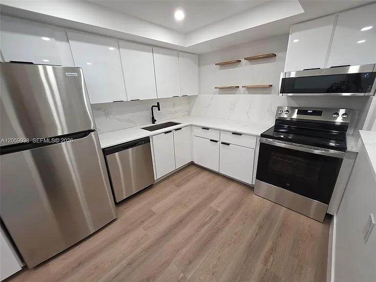501 Three Islands Blvd #112 — Photo 4