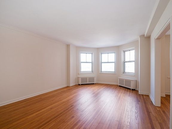 Large living room with bay window