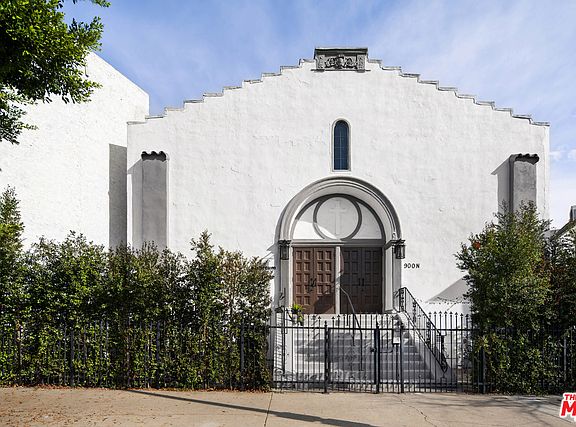 Front entrance to historical church apartment building with secure entry