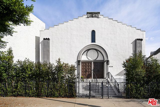 Front entrance to historical church apartment building with secure entry