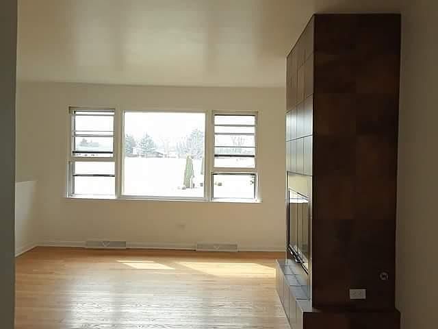 Beautiful window facing the park across the street from living room