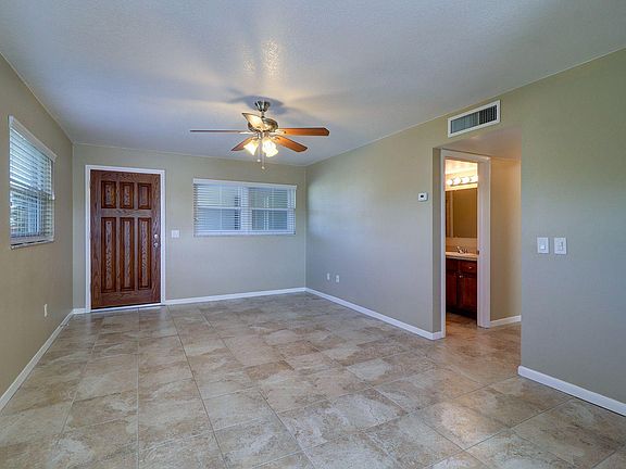 Front entry opens to living area