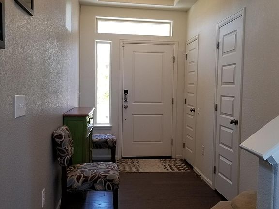 1/2 bath and coat closet shown on right.