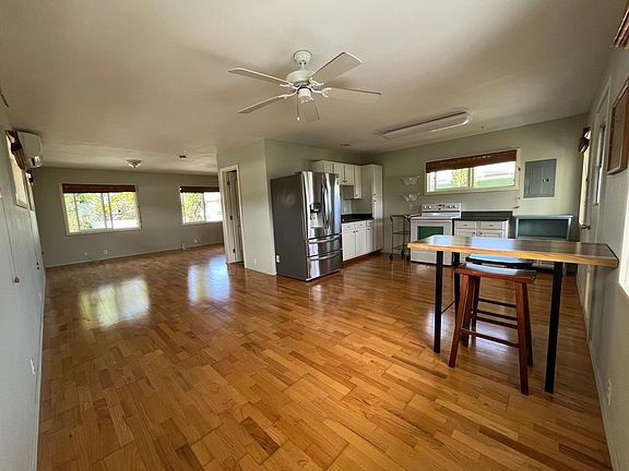 Living area, dining area and kitchen.