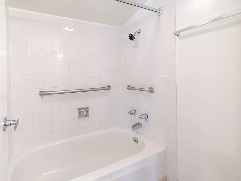Relaxing bathtub and shower combo.