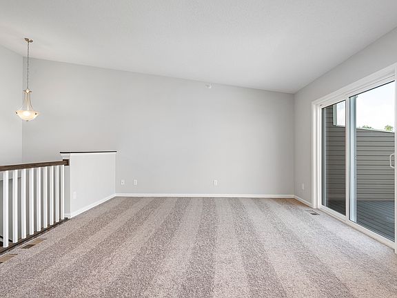 The spacious family room makes the perfect place to gather with friends and family