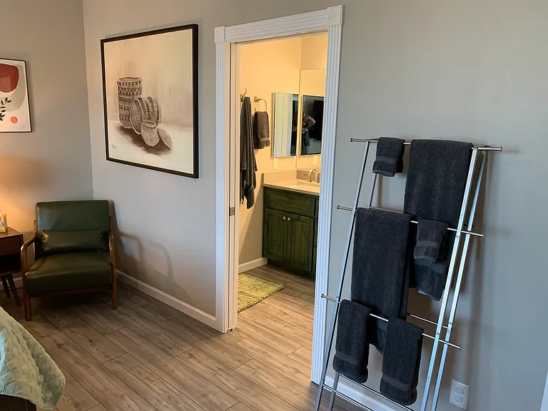Outside the Master Bath. A nice leather chair to relax before bed.