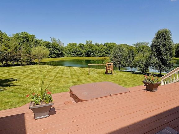 The definition of Privacy and Tranquility! Relax on your large deck overlooking the pond.