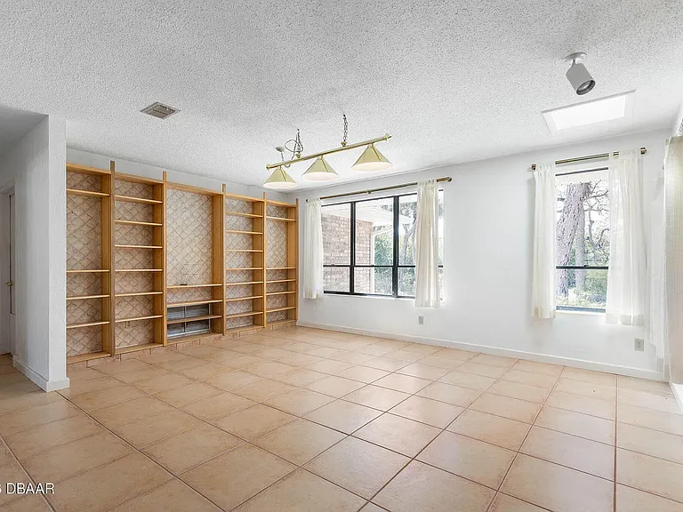 Great area for a large dining room or pool table room