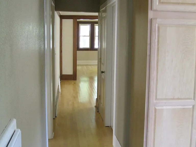Hallway from kitchen to front of the apartment.