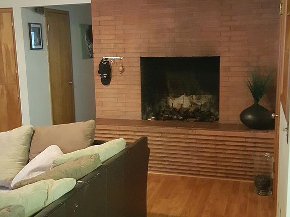 One of 3 Brick Fireplaces