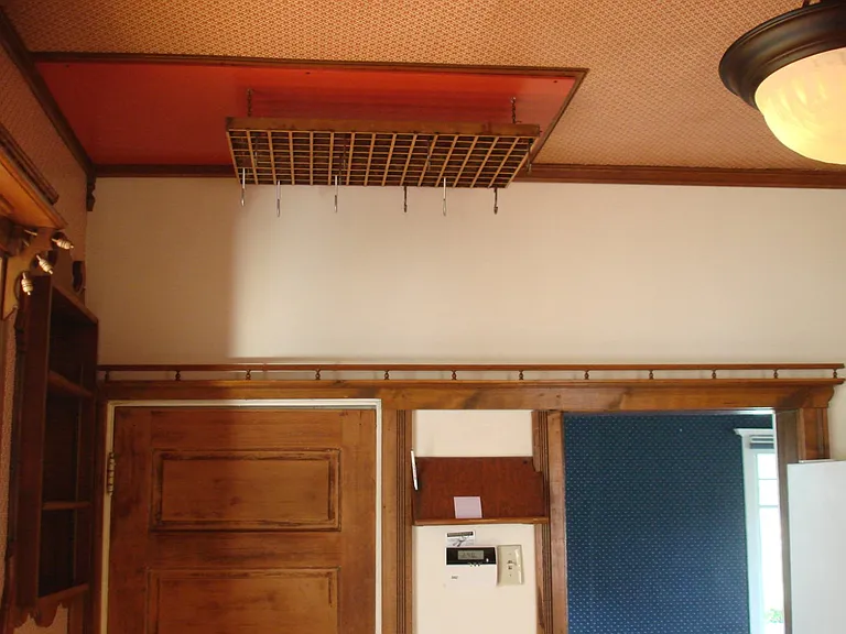 Pot Hooks and Plate Rails
Add to the Unique Character
of the Kitchen at the Yellow House