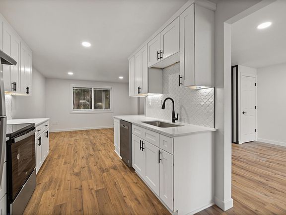 Spacious floor plan allows easy access between kitchen and living room.