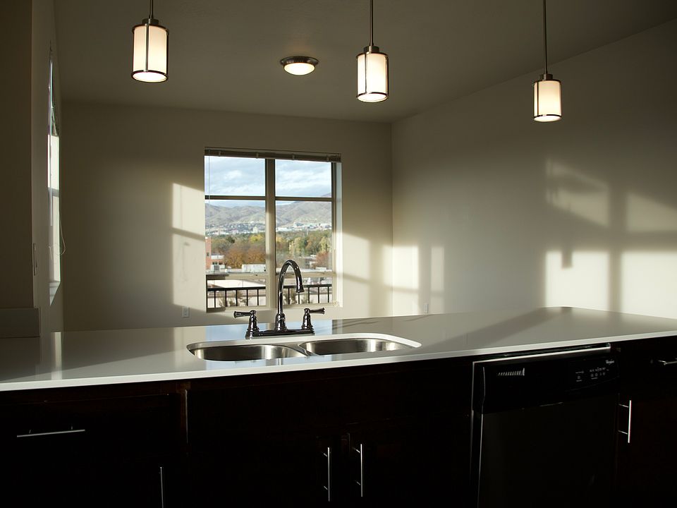 10 ft ceilings and large dual-pane windows to enjoy natural light and the beautiful views of Sugarhouse.