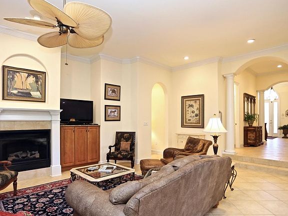 Living room looking to hall and foyer