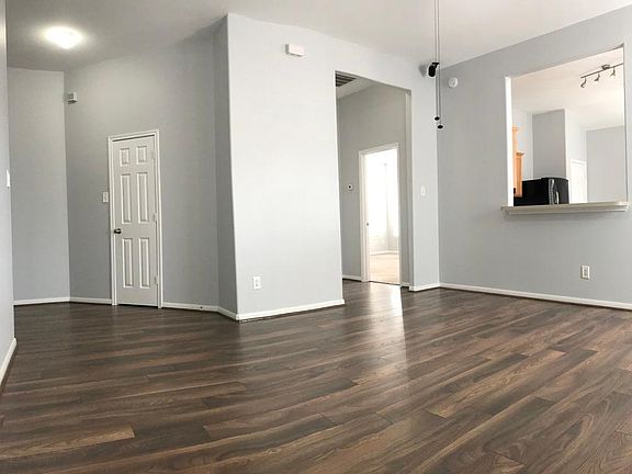 Spacious living room. Whole house has tall, 12-foot cielings.