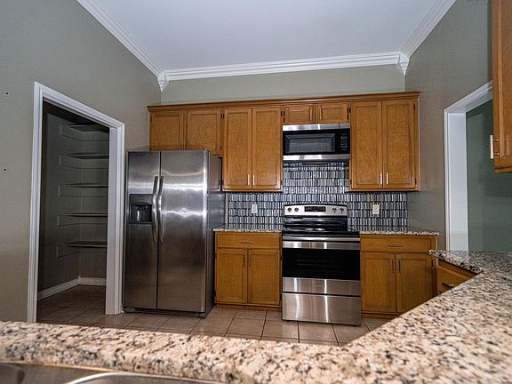 Kitchen. Refrigerator does not convey. You need to provide your own refrigerator.