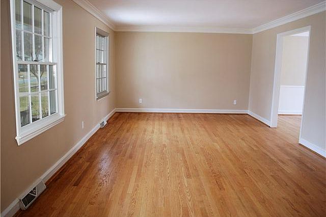 Expansive living room with neutral paint