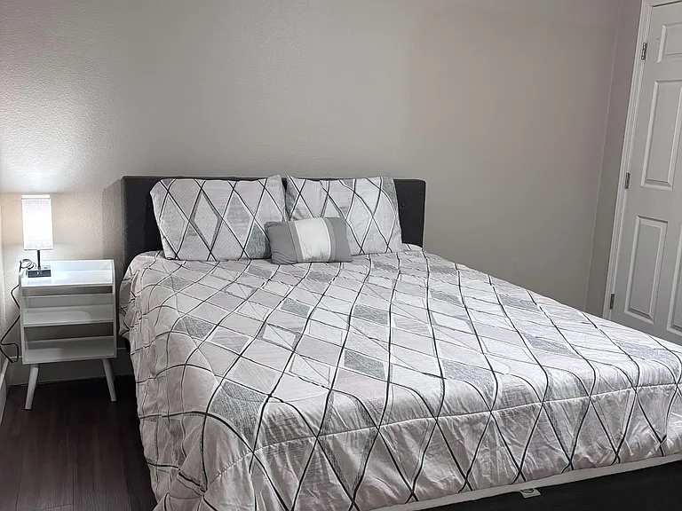 Fourth room with queen bed