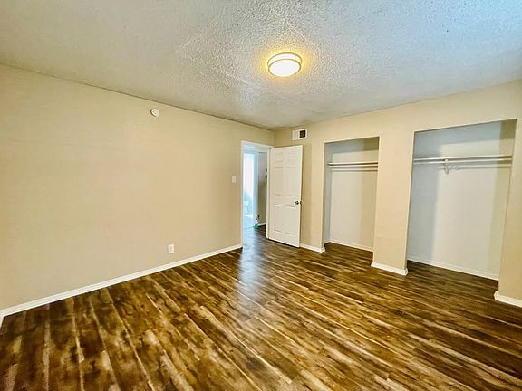 Vinyl flooring throughout.