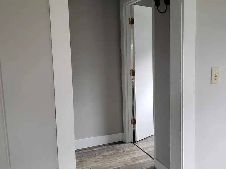 Living room hallway to main bathroom