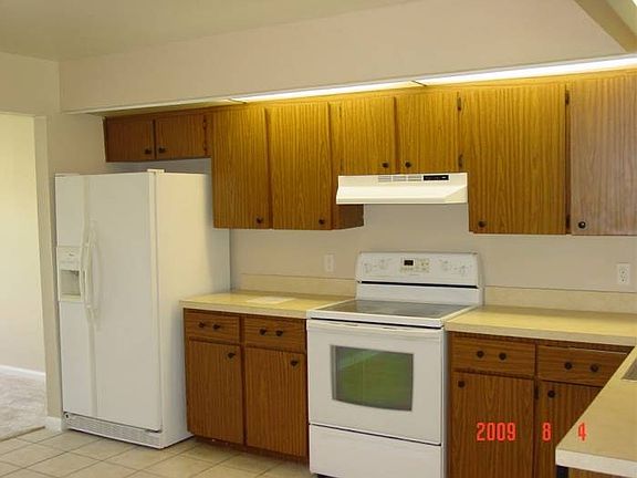 Kitchen before floor was changed in livingroom