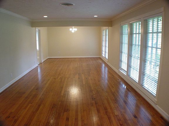 Formal Living and Dining room feature hardwood floors, crown mouldings.
