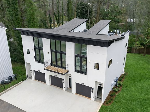 Expansive Rooftop Terrace and Tree-Lined Backyard