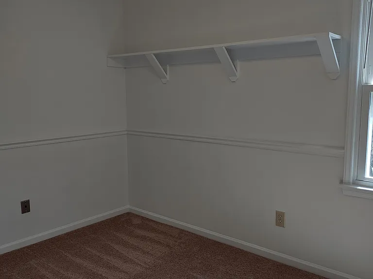 This photo has not been altered in any way: no edits or filters have been applied to try to deceive the viewer by having the room appear larger or brighter than it actually is.