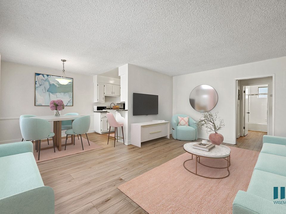 Open-Concept Kitchen, Dining, and Living Room withVinyl Flooring