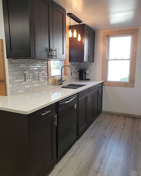 New cabinets. Quartz counter