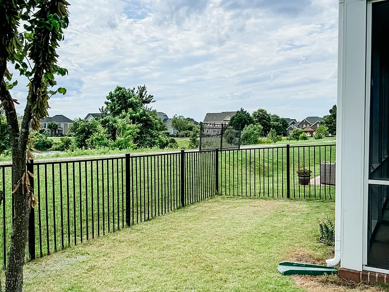 Fenced yard with water view!