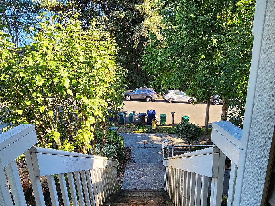 steps in front of the unit that lead to the living area, dining, kitchen and powder room